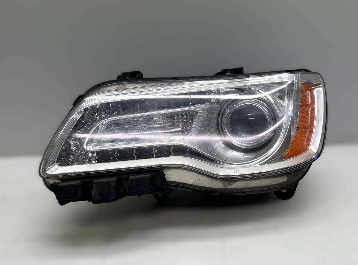 CHRYSLER 68042155AE BAM92-143700 BAM92143700 Headlight left CHRYSLER 300C II (2010-2023)