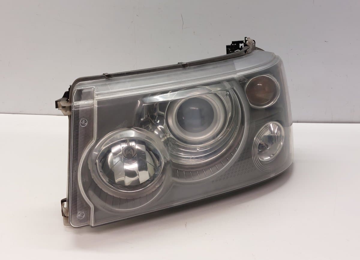 LAND ROVER XBC501733LZN Headlight left LAND ROVER RANGE ROVER SPORT I (L320) (2005-2013)