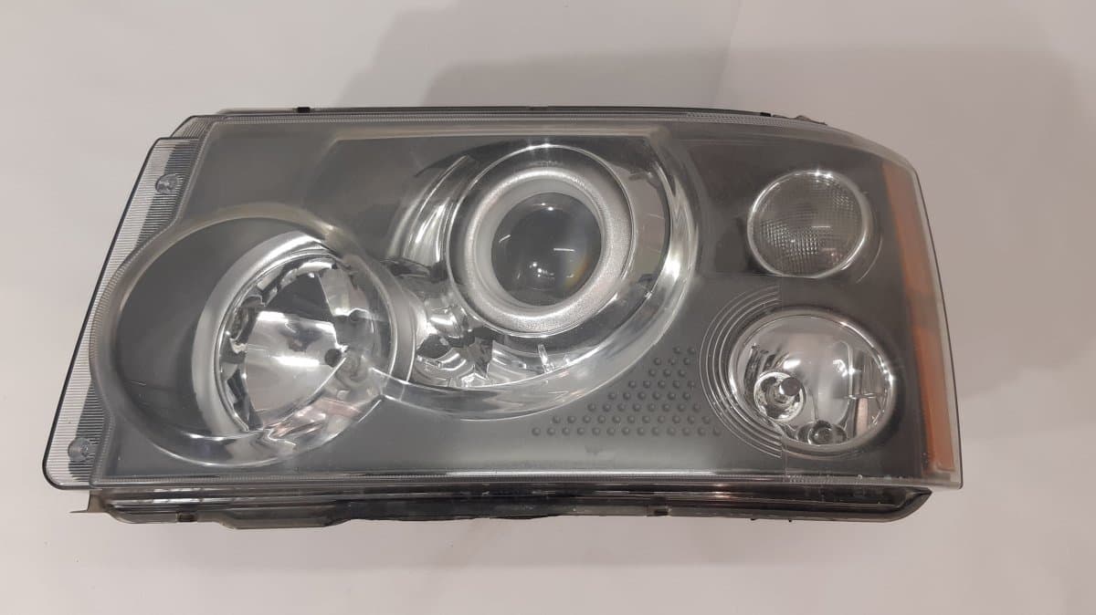 LAND ROVER Headlight left LAND ROVER RANGE ROVER SPORT I (L320) (2005-2013)