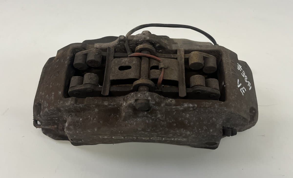 PORSCHE 95535142133 Brake caliper Front left PORSCHE CAYENNE I (2002-2010)
