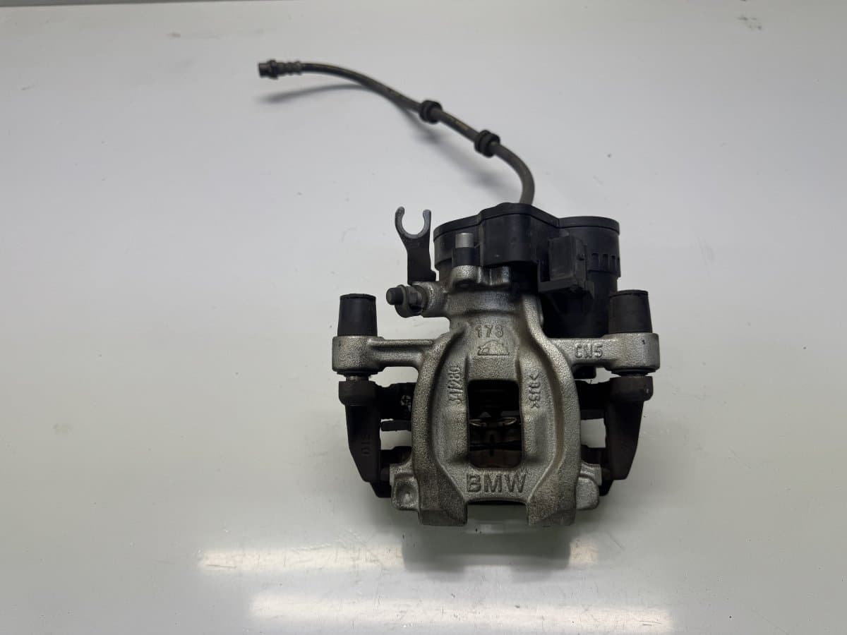 BMW 34206883025 6883025 Brake caliper rear left BMW 2 Active Tourer (F45, F46) (2013-2021)