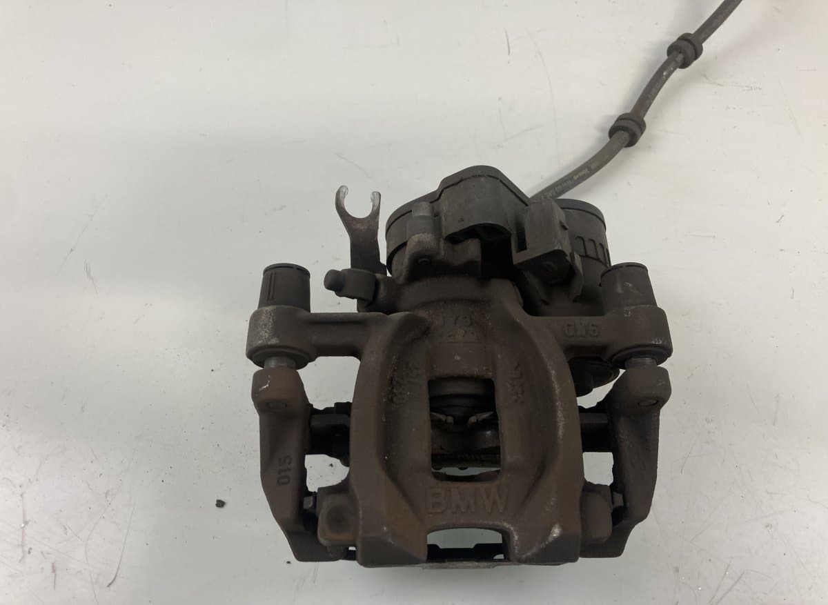 BMW 6798957 679895706 Brake caliper rear left BMW 2 Active Tourer (F45, F46) (2013-2021)