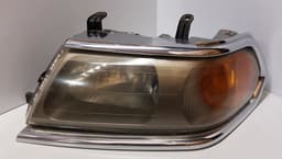 MITSUBISHI 100-87415 100-87416 Headlight left MITSUBISHI PAJERO SPORT (K90) (1997-2008) — thumbnail 1