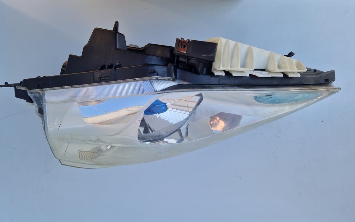 NISSAN 260603NK0A Headlight left NISSAN LEAF I (ZE0) (2010-2017)