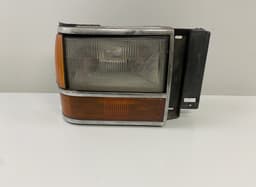 FORD E97B-13100 Headlight right FORD BRONCO (1988-1990) — thumbnail 1