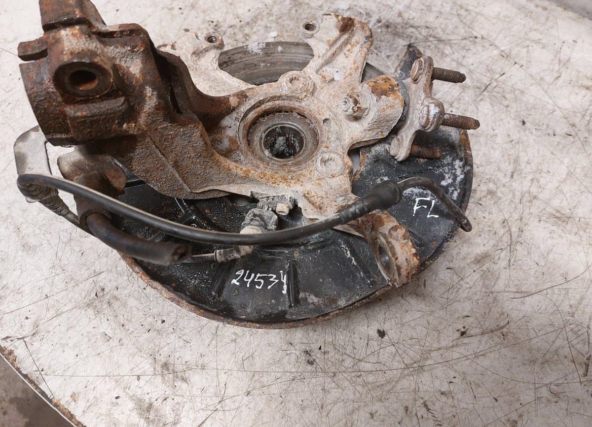 SKODA Wheel bearing housing front left SKODA OCTAVIA II (1Z) (2004-2013)