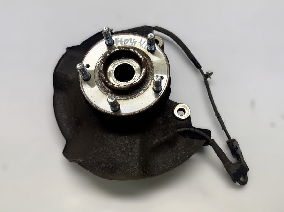 KIA 517152P000 Wheel bearing housing front left KIA SORENTO II (XM) (2009-2015)
