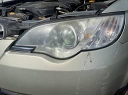 SUBARU Headlight left SUBARU LEGACY IV / Outback (2003-2009) — thumbnail 1