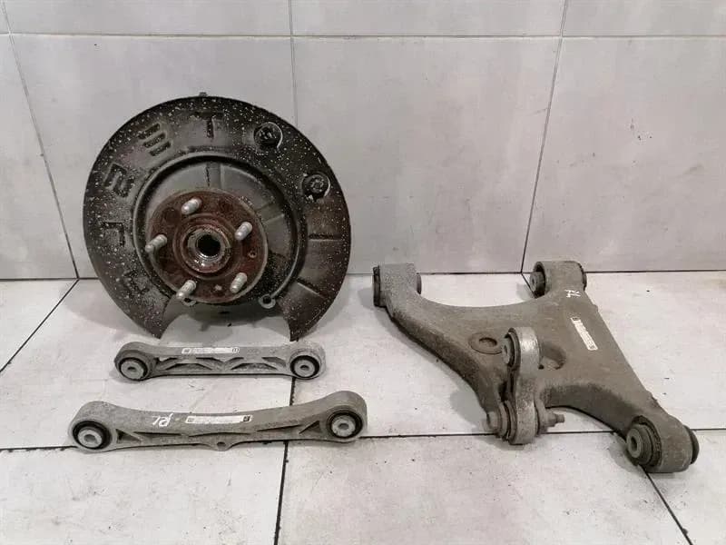 Tesla Model S 75 Left Rear Hub 1042506-00-B Wheel Bearing Housing Rear Left