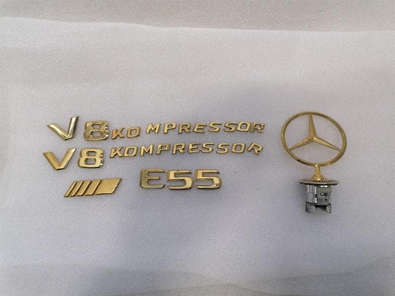 MERCEDES-BENZ Mercedes E55 Class W211 LOGO GOLDEN MB STAR GOLD AMG COMPRESSOR A2028800186