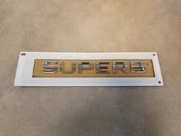 VW Genuine VW SKODA 3V0853687 A 2ZZ Lettering Logo Emblem SUPERB 3V0853687A 2ZZ — thumbnail 1
