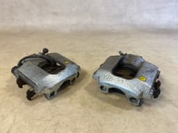 BMW BMW E23 7 SERIES GENUINE Rear Caliper With Brake Pads Left & Right — thumbnail 1