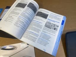BMW Original BMW X5 E70 CCC ESPANOL OWNER MANUAL HANDBOOK WITH CASE WALLET — thumbnail 2