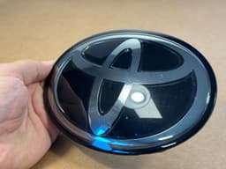 TOYOTA Genuinre FRONT GRILLE EMBLEM For TOYOTA TACOMA TUNDRA RADAR COVER 90975-02159 — thumbnail 7