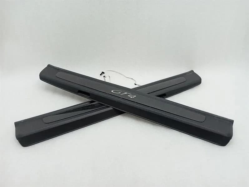 PORSCHE PORSCHE 718 GT4 X69 DOOR SILL GUARDS IN CARBON SET TRIM ILLUMINATED 98150498253-