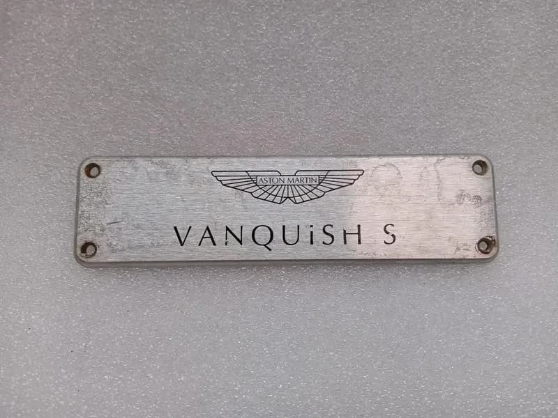 ASTON MARTIN ASTON MARTIN VANQUISH S 04-07 V12 VANQUISH S LOGO DOOR POST PLATE