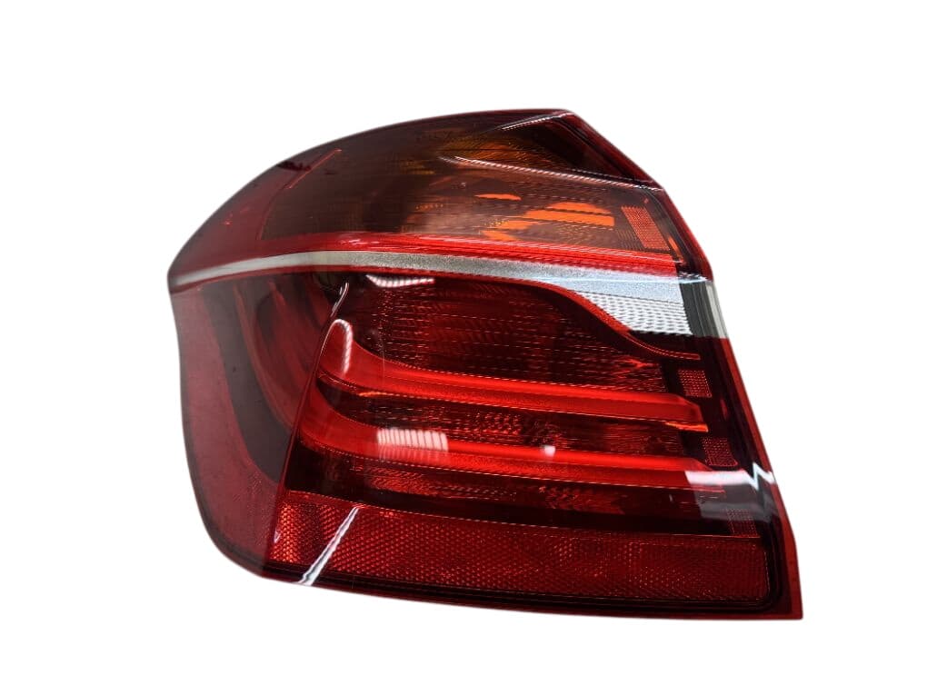 BMW 7311059 Tail light left BMW 2 Active Tourer (F45, F46) (2013-2021)